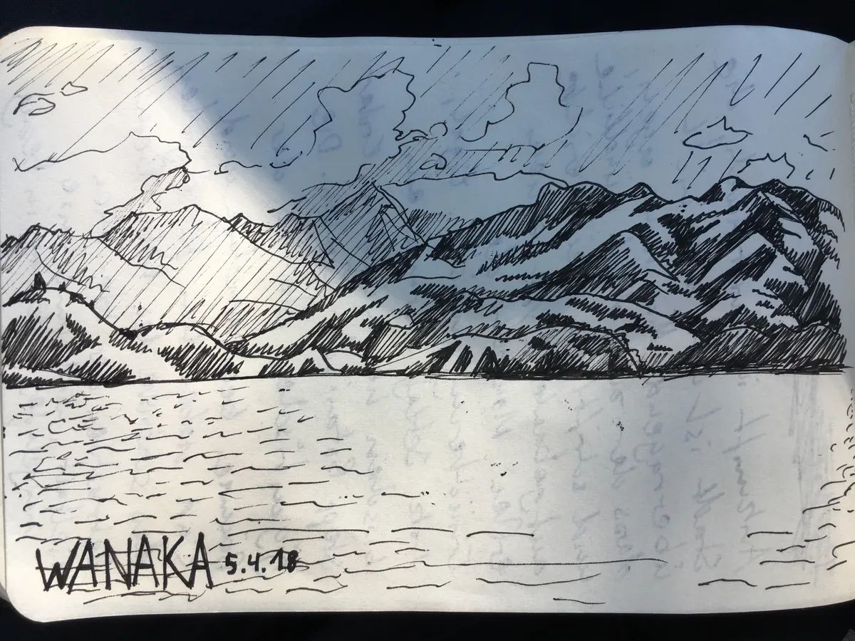 Ink sketch in a notebook: rain over the mountains around Lake Wanaka, dated 5.4.18.